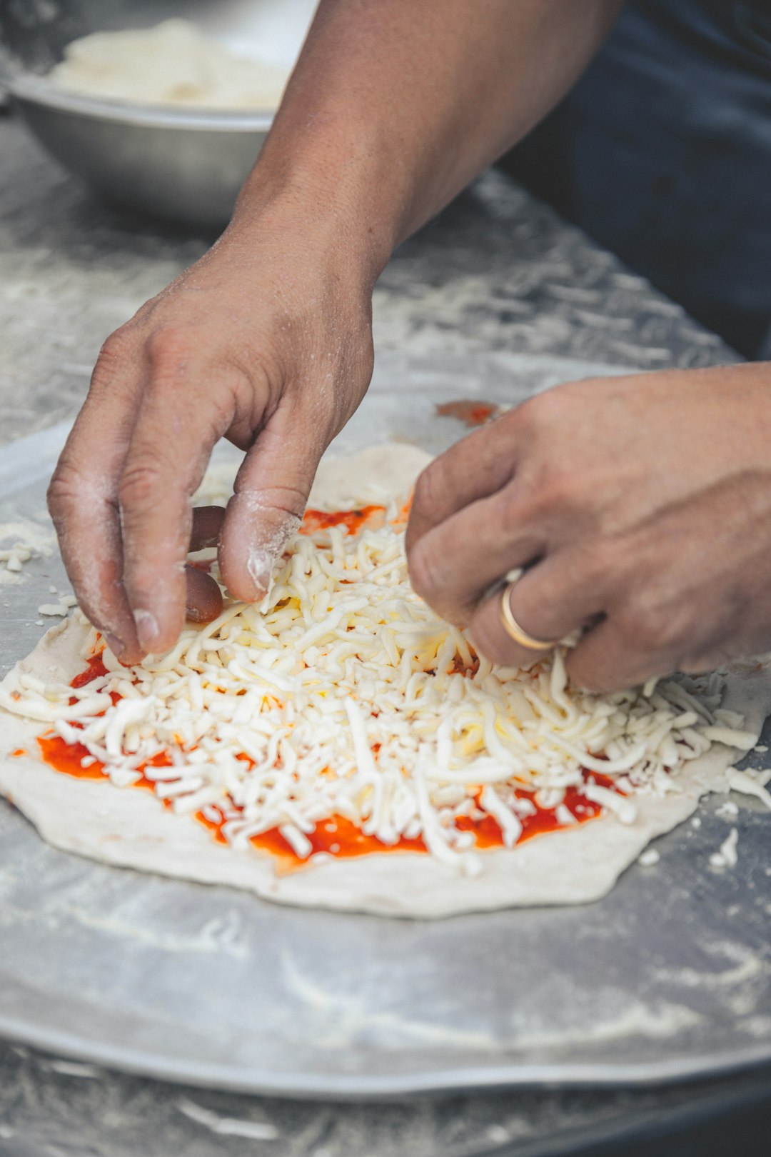 Fresh mozzarella being made by hand
